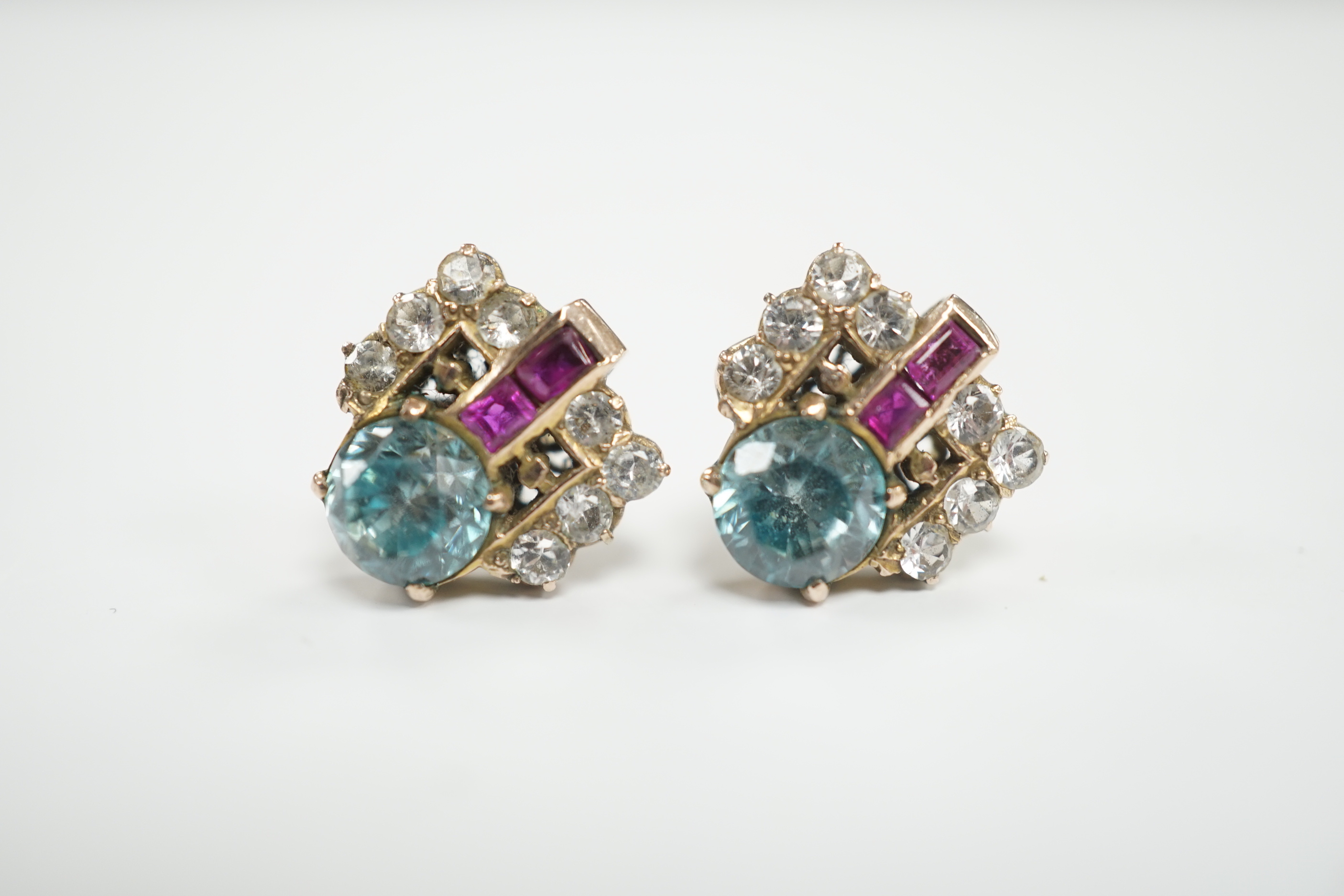 A pair of Art Deco yellow metal, blue zircon and two colour paste set cluster ear studs, 11mm, gross weight 4 grams.